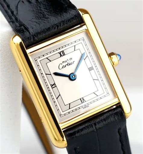 orologio cartier vintage argento rettangolo|7 Must.